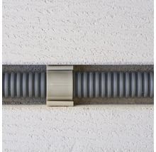 Kabelrör med klämma i puts