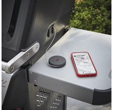 Smart Probe temperaturmätare med smartphone på ett grillbord