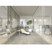 Ljust rum med sittmöbler, bord och växt för vardagsrummet