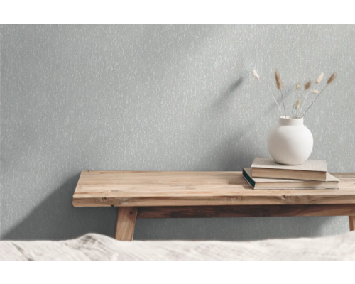 Tapet i interiör med bord, böcker och dekoration