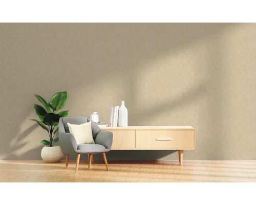 Vardagsrumsscen med fåtölj, krukväxt och skänk i skandinavisk stil