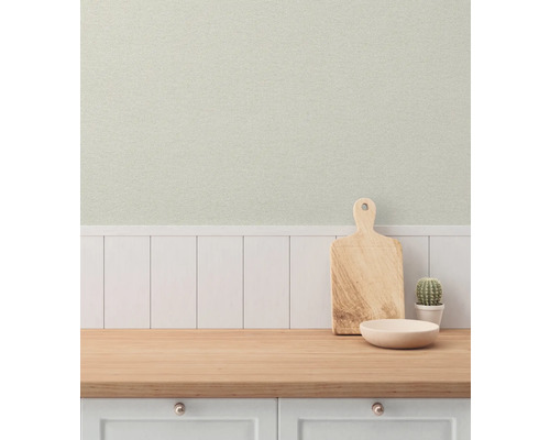 Köksscen med bänkskiva, skärbräda, skål och kaktus