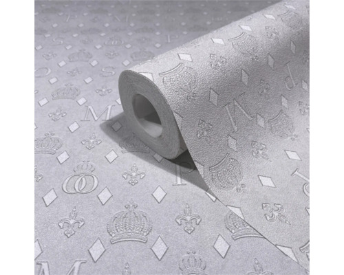 Rulle papperstapet med kron- och bokstavsmönster