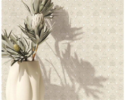 Dekorativ tapet med kronor, bokstäver och blommönster