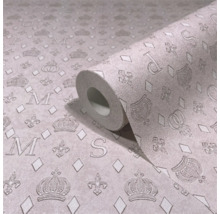 Rulle vinyltapet med kronor, bokstäver och rombmönster