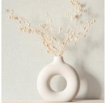 Dekorativ vas med växtstjälkar