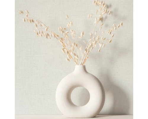 Dekorativ vas med växtstjälkar