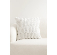 Dekorativ kudde med mönster på en soffa