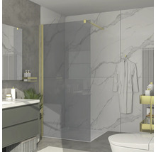 Badrum med duschkabin, tvättställ och toalett i modern design