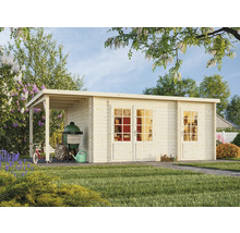 Trädgårdshus med grill, cykel och trädgårdsredskap i trädgården