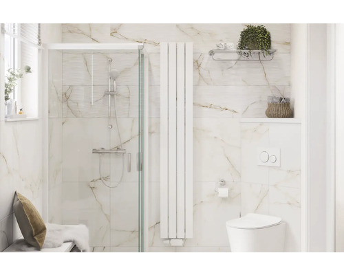 Badrum med dusch, element och toalett i en ljus och rymlig design.