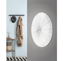 Dekorativ rund vägglampa i hallen