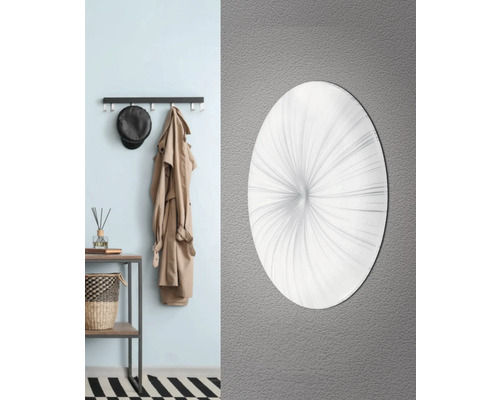 Dekorativ rund vägglampa i hallen