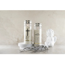 Två gravljus med motiv och silverfärgat lock