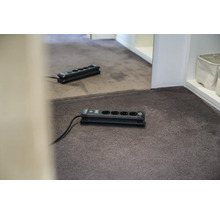 Grenuttag med fem uttag på matta