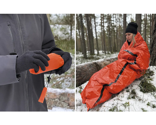 Person insvept i en orange räddningsfilt i skogen. Närbild av en förpackad räddningsfilt.