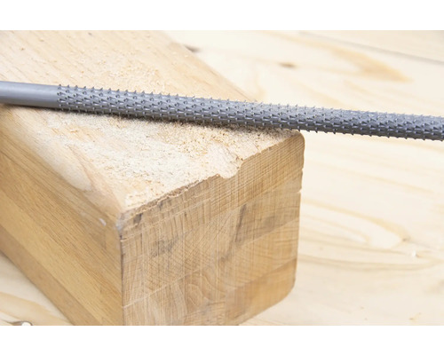 Trärasp för bearbetning av en träbit