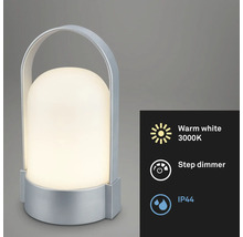 Bärbar LED-bordslampa med silverfärgat hölje och handtag, varmvitt ljus 3000 Kelvin, stegvis dimmer och kapslingsklass IP44.