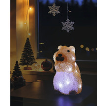 Belyst LED-julfigur i form av en quokka i en julscen med små granar.