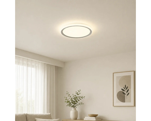 Rund LED-taklampa i ett ljust, modernt inrett vardagsrum med minimalistisk design.