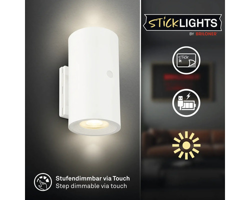 Cylindrisk vägglampa med LED för montering med lim från Briloner med touchdimmer och batteri med USB laddning.