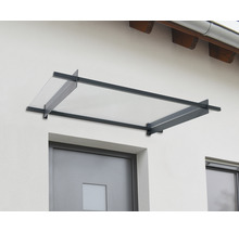 Metall- och glastak över en ytterdörr