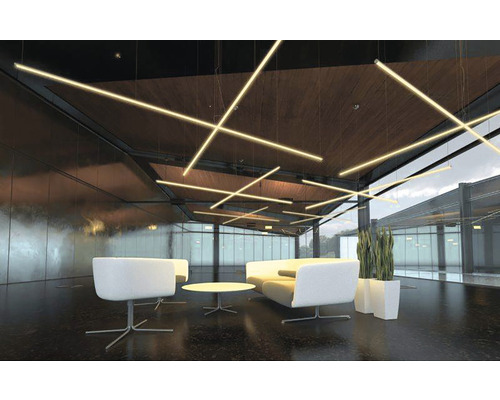 Modern mottagningsrum med pendellampor, sittplatser och krukväxter