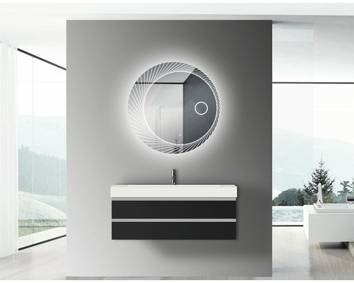 Badrum med underskåp för handfat, handfat och rund spegel med belysning