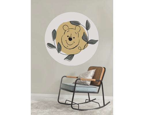 Nalle Puh väggdekal ovanför en gungstol