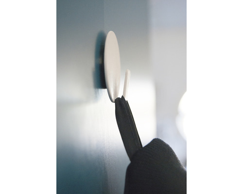 Väggkrok med hängande väska