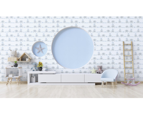 Barnrum med elefanttapet, rund väggdekoration och möbler