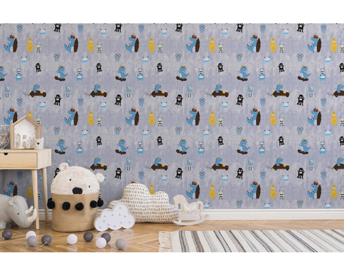 Barntapet med dinosaurie- och monstermotiv i ett ljust barnrum.