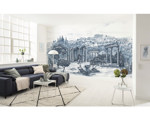 Vardagsrum med landskapstapet, soffa och matta