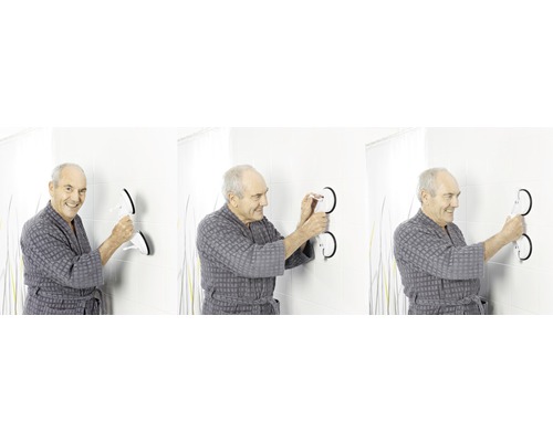 Man fäster ett stödhandtag med sugkoppar i badrummet