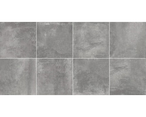 Gråa plattor med cementutseende, lämpliga för vägg- och golvbeläggning.