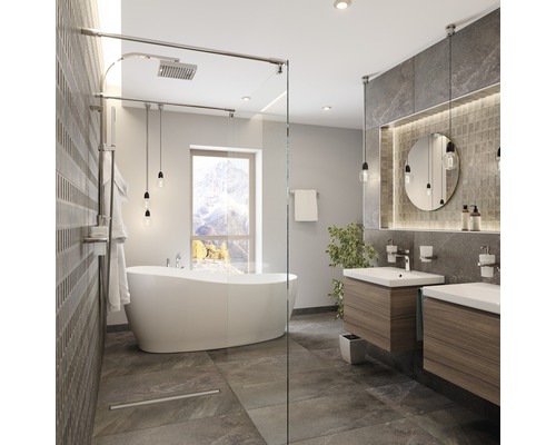 Ljust badrum med dusch, badkar och dubbla handfat