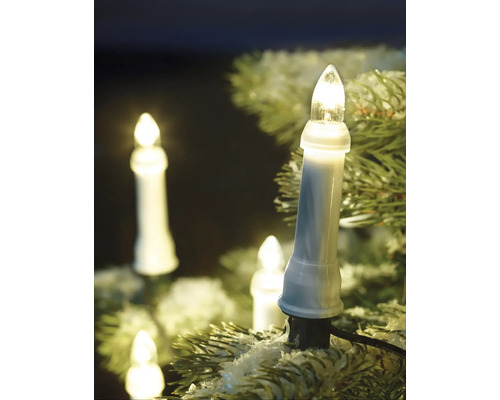 Julgransbelysning i ljusdesign på grangrenar