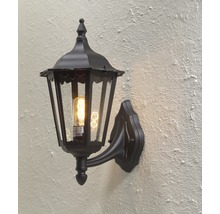 Klassisk vägglampa av metall med glasinsatser för utomhusbruk