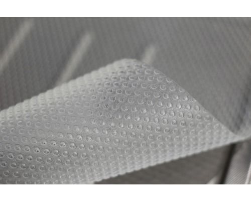 Närbild av ett poolskydd med bubbelplast