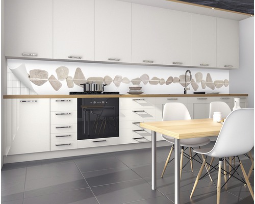 Stänkskydd med stenmotiv i ett modernt kök.