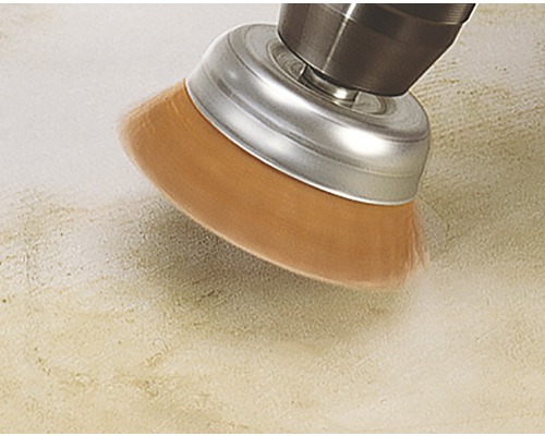 Borstfäste för borrmaskin vid användning