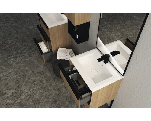 Modernt badrum med tvättställ, spegel och lådor