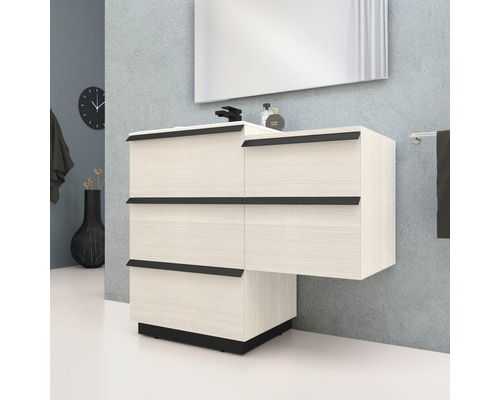 Tvättställ med lådor, spegel och armatur i badrum