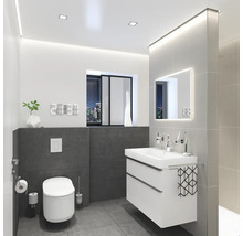 Modernt badrum med toalett, tvättställsskåp, spegel och digital klocka