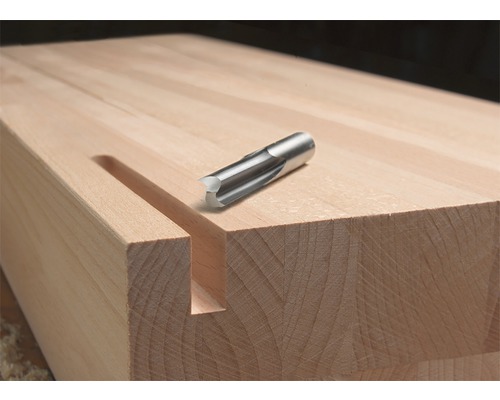 Träblock med spår och en spårfräs