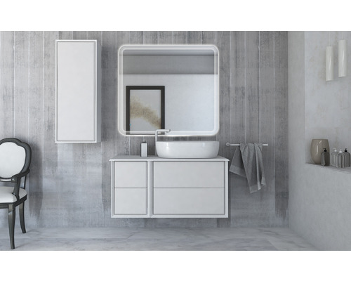 Badrum med handfat, underskåp, spegelskåp och spegel