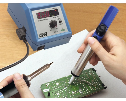 Lödarbete med lödkolv, avlödningspump och lödstation