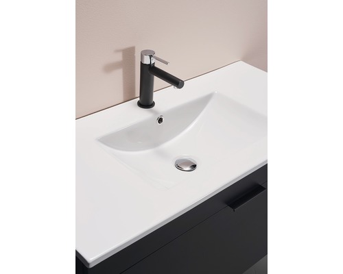 Tvättställ med svart blandare och vit handfat