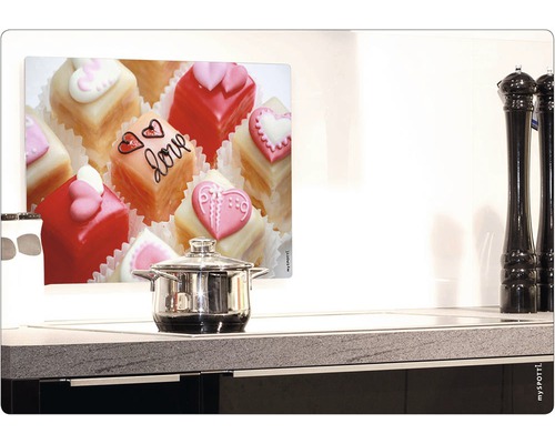 Stänkskydd med motiv av petit fours