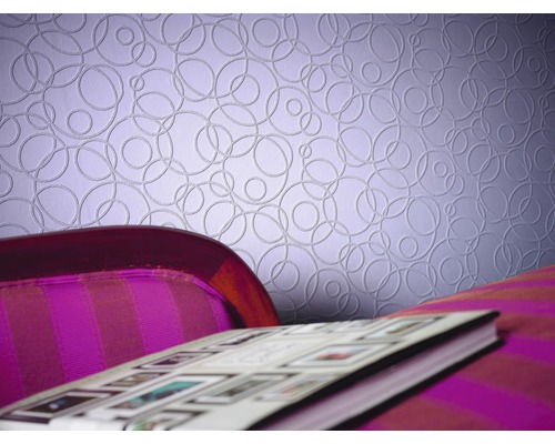 Närbild av en mönstrad tapet med cirkeldesign